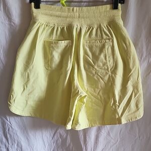 Athleta Light Yellow High-Waist Smocked Shorts